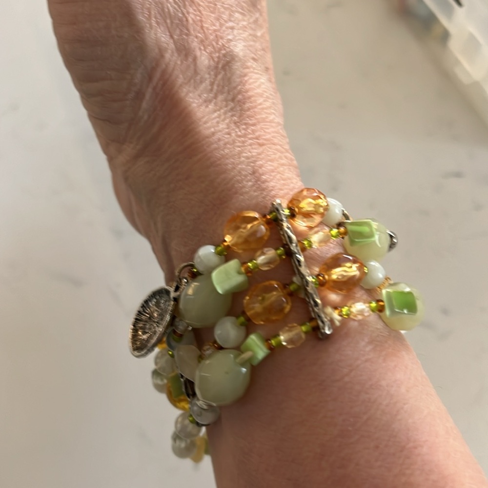 Green and good bracelet with silver accents.